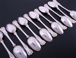 A set of 12 William IV King's pattern sterling silver table spoons