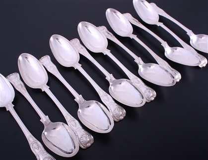 A set of 12 William IV King's pattern sterling silver table spoons