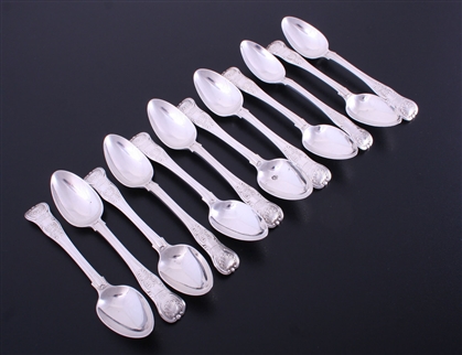 A set of twelve George IV King's pattern sterling silver tea spoons