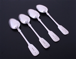 A matched set of four Victorian fiddle pattern sterling silver table spoons