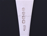 A set of four George III Old English pattern sterling silver table forks
