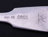 A set of nine Irish George IV fiddle pattern sterling silver table forks