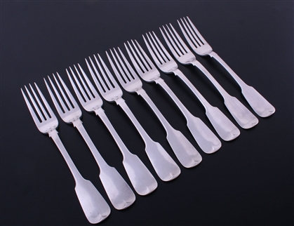 A set of nine Irish George IV fiddle pattern sterling silver table forks