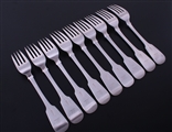A set of nine Irish George IV fiddle pattern sterling silver table forks