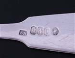 A fine set of twelve Victorian Irish fiddle sterling silver pattern table forks