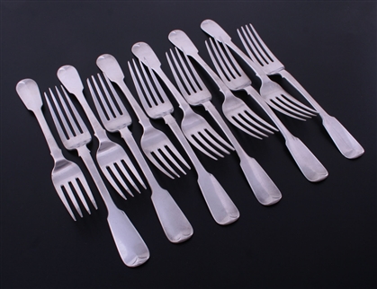 A fine set of twelve Victorian Irish fiddle sterling silver pattern table forks