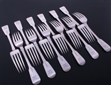 A fine set of twelve Victorian Irish fiddle sterling silver pattern table forks