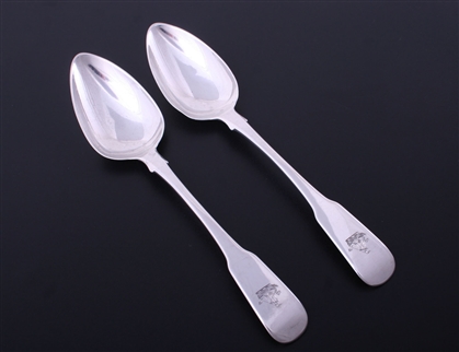 A pair of George III fiddle pattern sterling silver table spoons