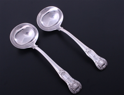 A pair of George IV King's Hourglass pattern sterling silver sauce ladles
