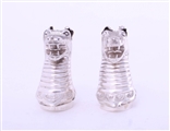A rare pair of Victorian sterling silver heraldic novelty pepper casters