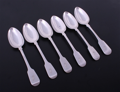 A matched set of six antique fiddle pattern sterling silver table spoons