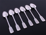A matched set of six antique fiddle pattern sterling silver table spoons