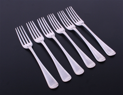 A matched set of six George III Old English Thread pattern sterling silver table forks