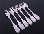 A matched set of six antique fiddle pattern sterling silver table forks