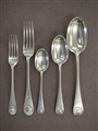 A fine Victorian canteen of Old English with shell pattern sterling silver flatware for twelve people