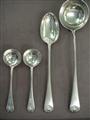 A fine Victorian canteen of Old English with shell pattern sterling silver flatware for twelve people