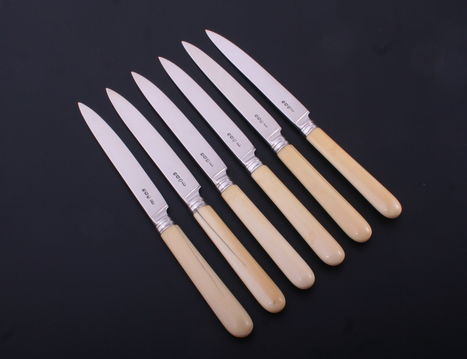 A set of six III sterling silver cheese knives