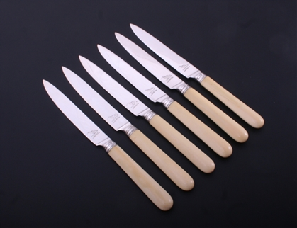 A set of six George III sterling silver cheese knives