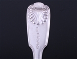 A set of four Victorian fiddle, thread and shell pattern sterling silver table spoons