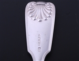A set of twelve Irish Victorian fiddle, thread and shell pattern sterling silver table forks