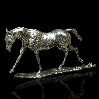 A fine sterling silver model of a horse 