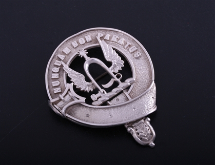 A Victorian silver clan badge