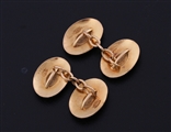 A fine pair of 18ct yellow gold armorial cufflinks