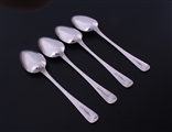 A set of four Scottish George IV Old English pattern sterling silver table spoons