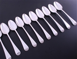 A set of ten George III Old English with thread pattern sterling silver table spoons