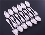 A set of twelve George IV sterling silver fiddle pattern table spoons