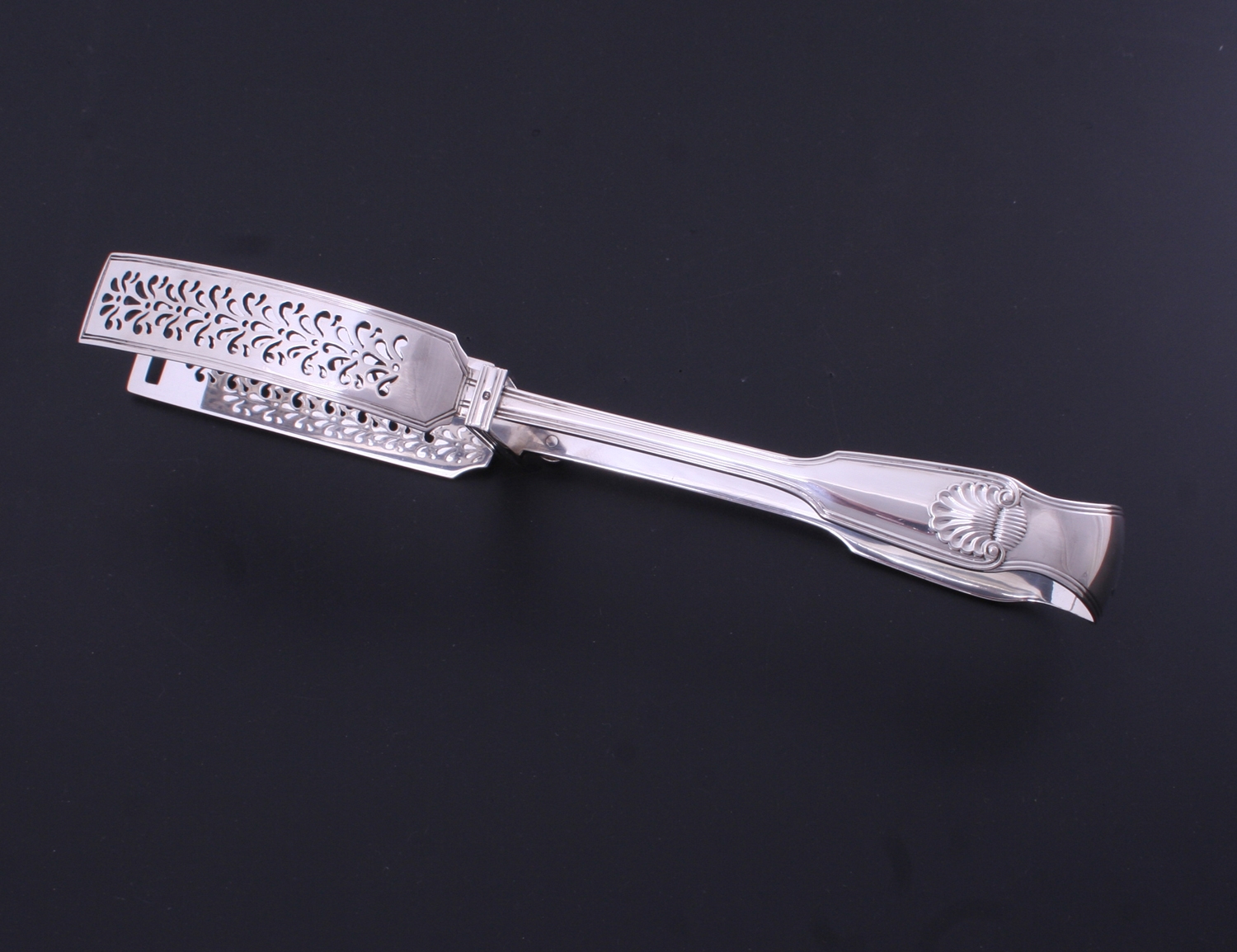 A pair of Victorian fiddle, thread and shell pattern sterling silver