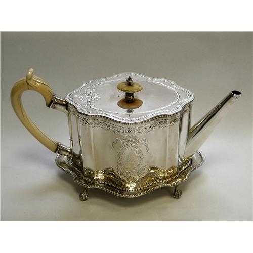 A pretty Victorian sterling silver teapot and stand