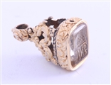 A 19th century gold and intaglio citrine fob seal