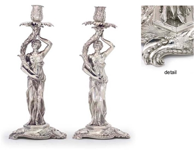 A magnificent and rare matched pair of George III and George IV silver candlesticks