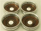 n exceptional, fine and impressive set of four antique Georgian English sterling silver coasters made by Robert Hennell I & Samuel Hennell
