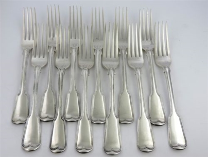 A set of twelve Antique George III fiddle and thread silver table forks