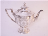 A Victorian three piece sterling silver tea set