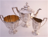 A Victorian three piece sterling silver tea set
