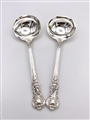 A pair of Antique Victorian Sterling silver Queens pattern sauce ladles 1855