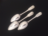 A set of three George III sterling silver fiddle and thread pattern table spoons