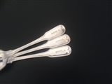 A set of three George III sterling silver fiddle and thread pattern table spoons