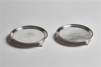 A fine pair of George III sterling silver small salvers