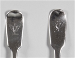 A matched set of five antique fiddle pattern sterling silver dessert forks