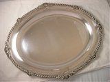 A fine and large George IV antique silver meat dish