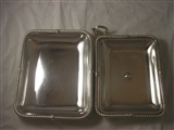 A pair of George III silver entree dishes