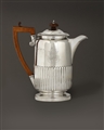 NAVAL INTEREST: A George IV silver coffee pot