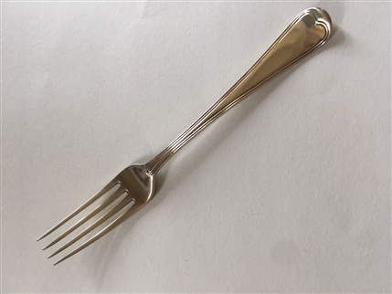 An antique George III silver gilt dessert fork