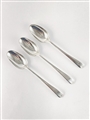 A set of three antique hallmarked sterling silver dessert spoons, Old English pattern 1764